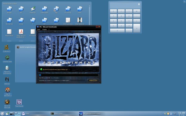 A KDE desktop showing the World Of Warcraft Updater for version 3.2