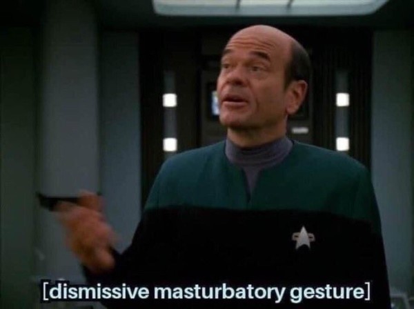 The holographic doctor from Voyager appears to be making a wanking gesture.
Caption: [Dismissive masturbatory gesture]