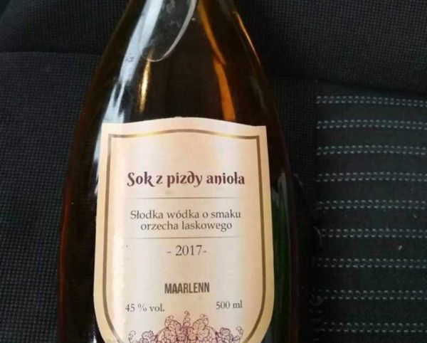 Bottle of sweet hazelnut vodka named "Sok z pizdy anioła", which translates directly to a "Angel cunt juice"