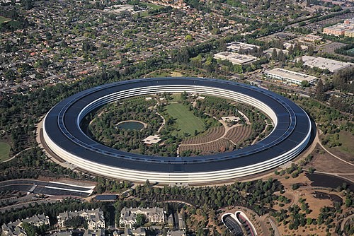 Apple HQ, a big black ring building in Cupertino with green space in the center of the ring